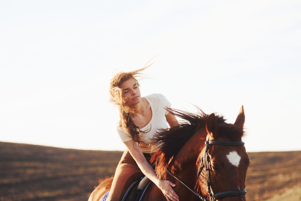 Woman Riding Horse