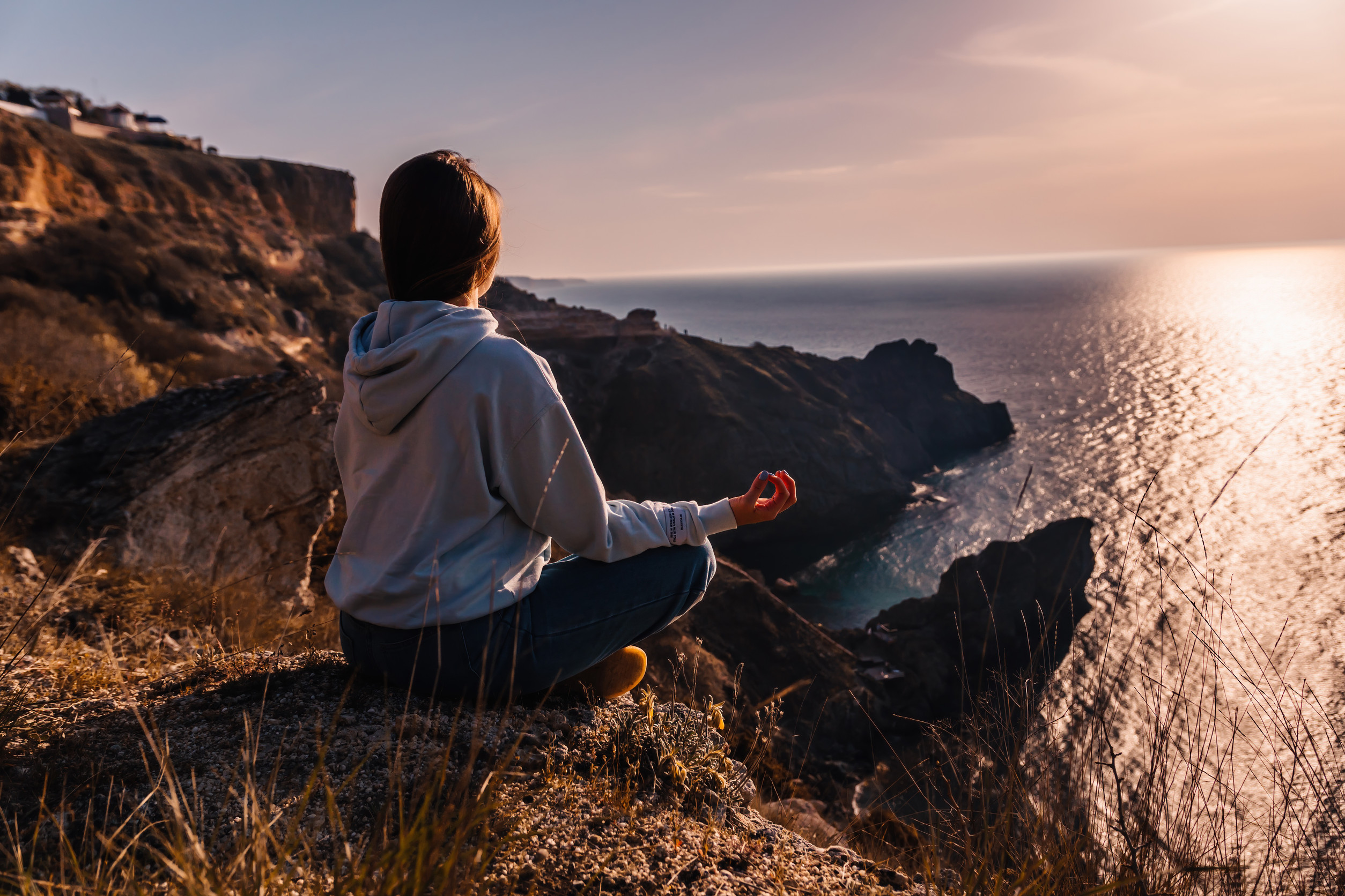 Person Looking out at Cliff